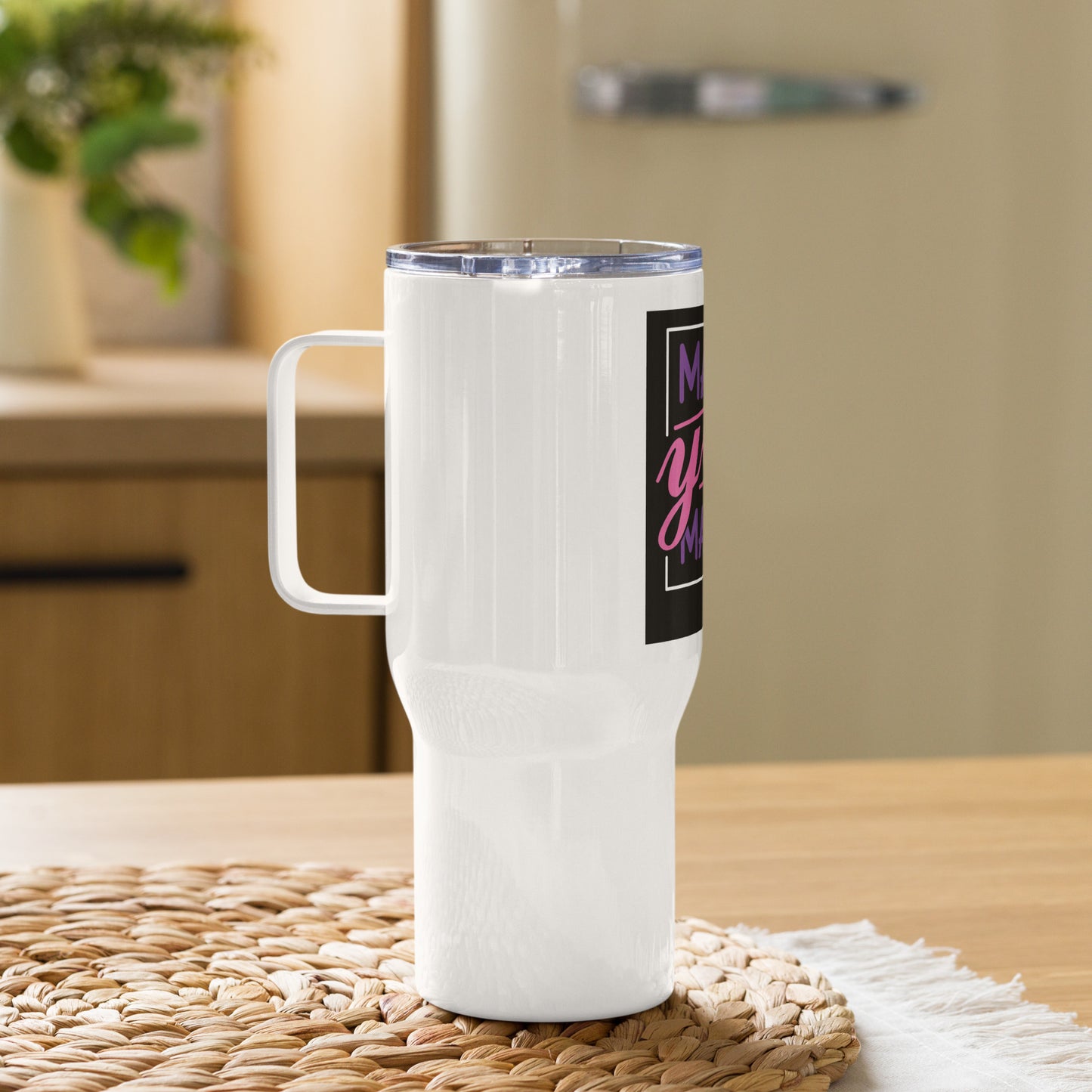 Travel mug with a handle